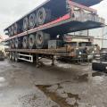 STACK OF 5 FLAT TRAILERS